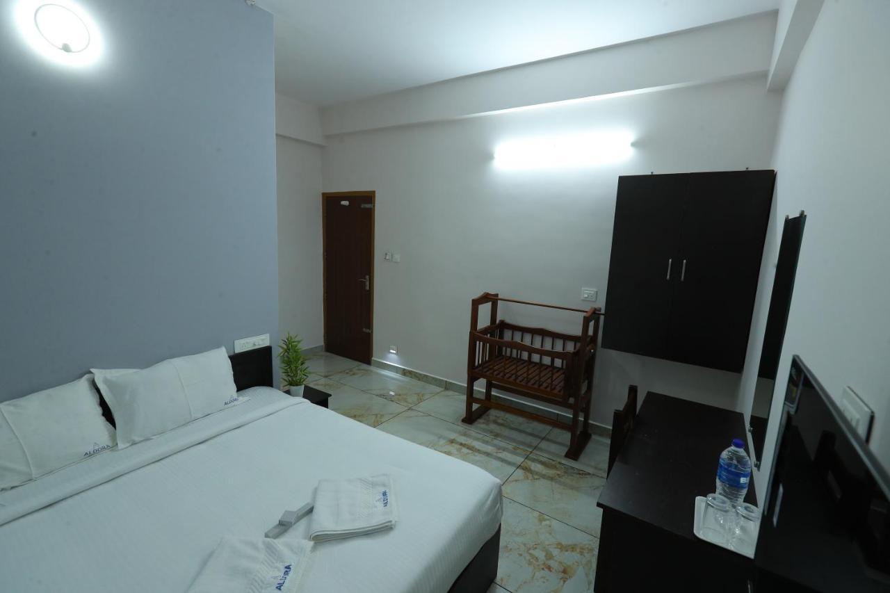 Hotel Aldora Airport Residency à Nedumbassery Extérieur photo